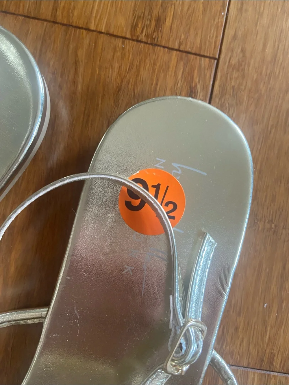 Nicole Miller Women’s size 9.5 US Metallic Silver Women's T-Strap Sandals